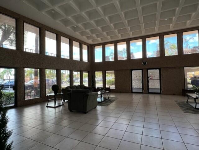 9300 Southwest 8th Street, Unit 408 Boca Raton, FL 33428 - Photo 3 of 18 3-Building lobby view #2