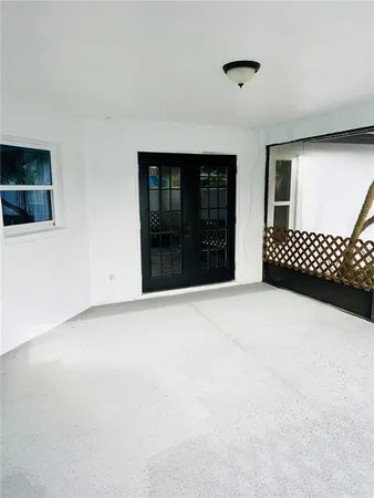 a view of a black and white fence
