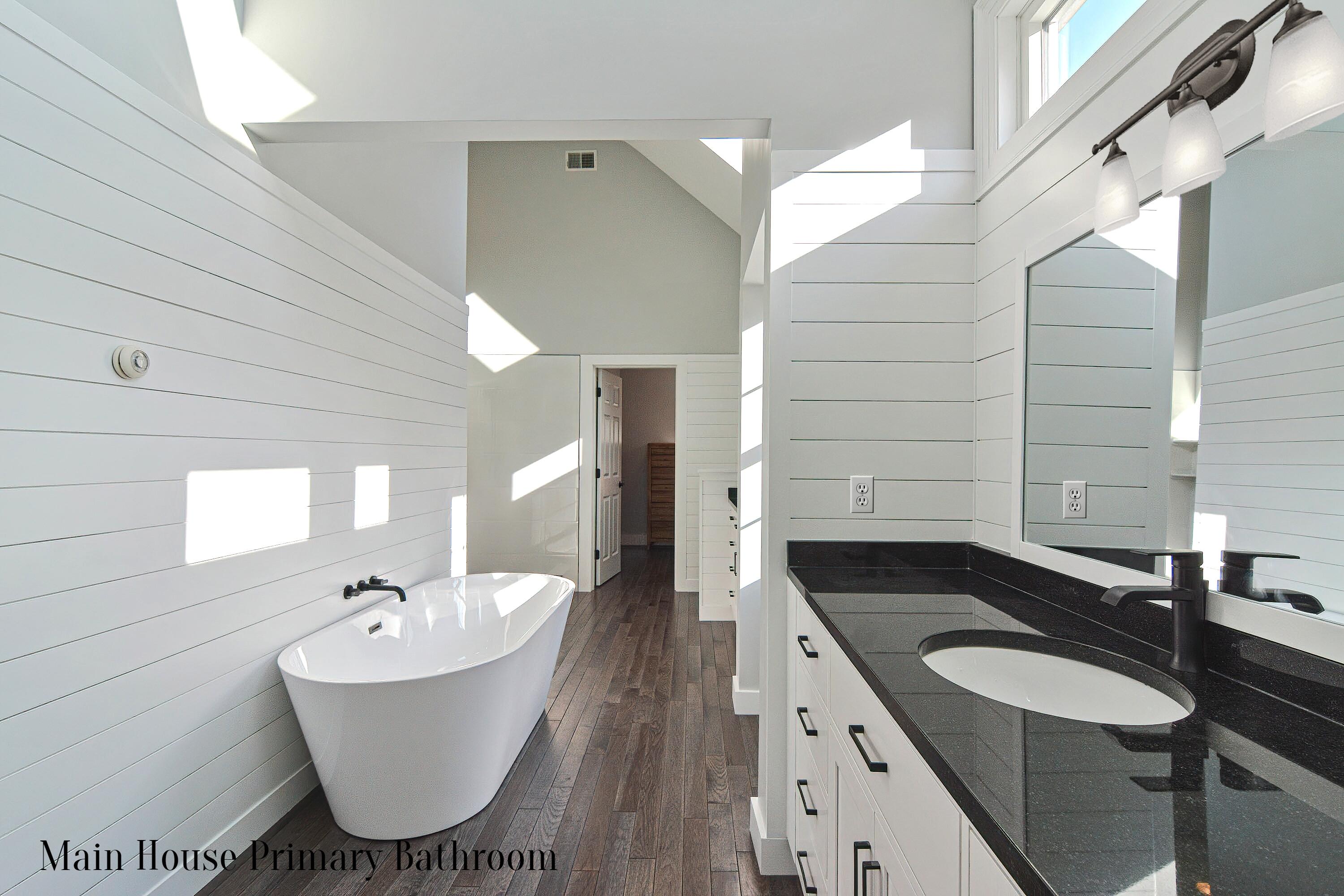12-13 Shell Lane Wareham, MA 02571 - Photo 20 of 52 a bathroom with a granite countertop sink and a bathtub