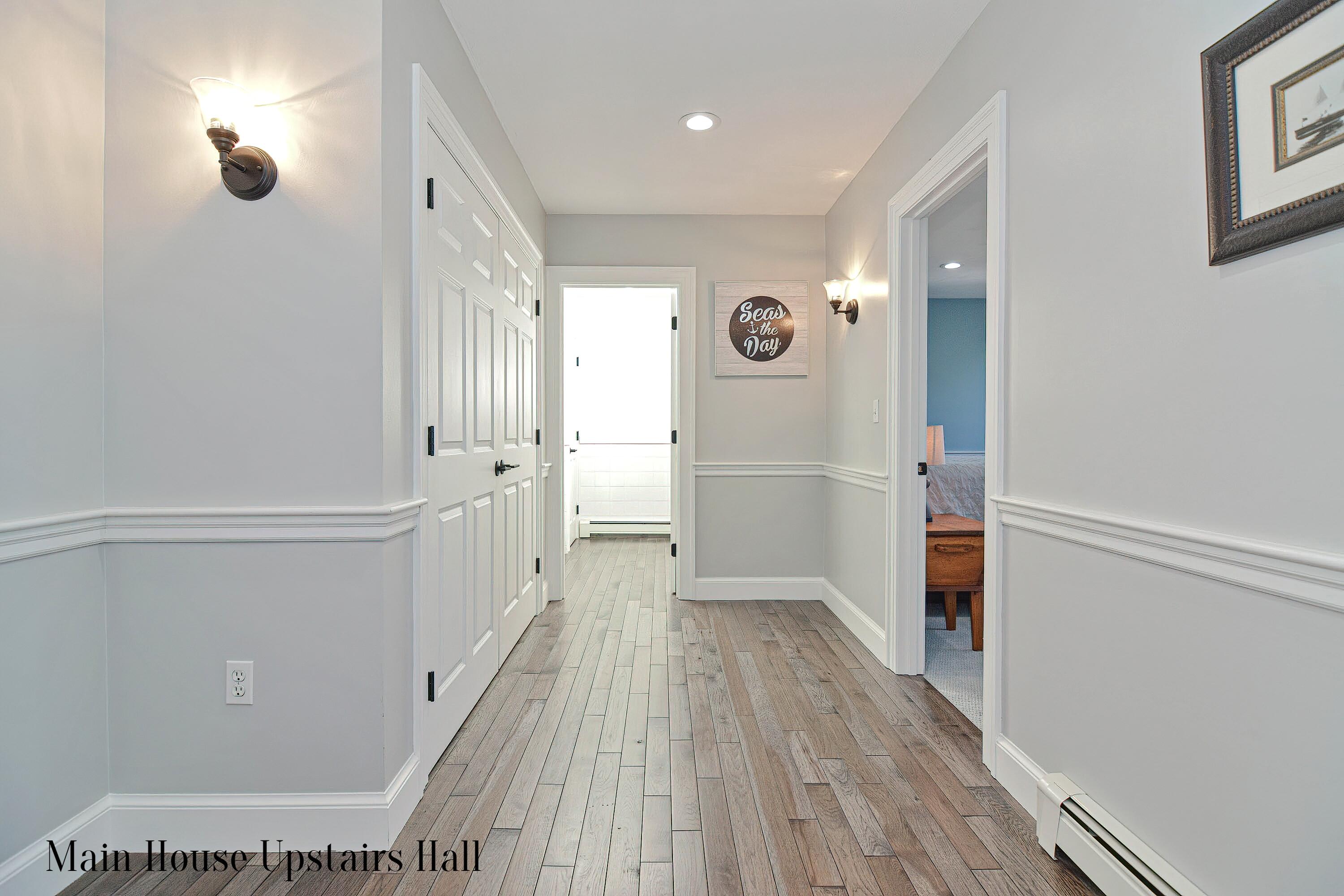 12-13 Shell Lane Wareham, MA 02571 - Photo 26 of 52 a view of a hallway with wooden floor