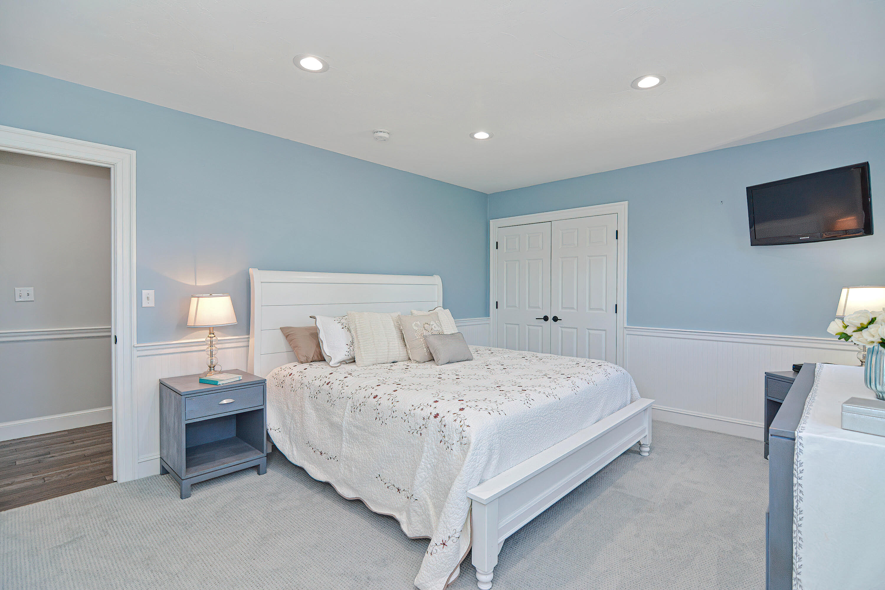 12-13 Shell Lane Wareham, MA 02571 - Photo 28 of 52 a bedroom with a bed and a flat screen tv