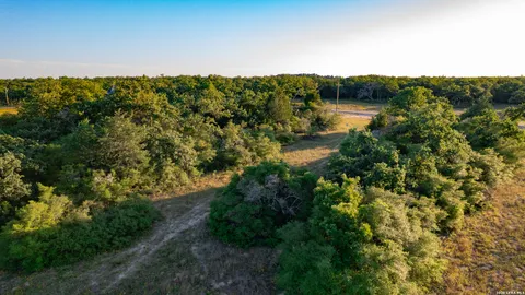 a view of a lake from a yard