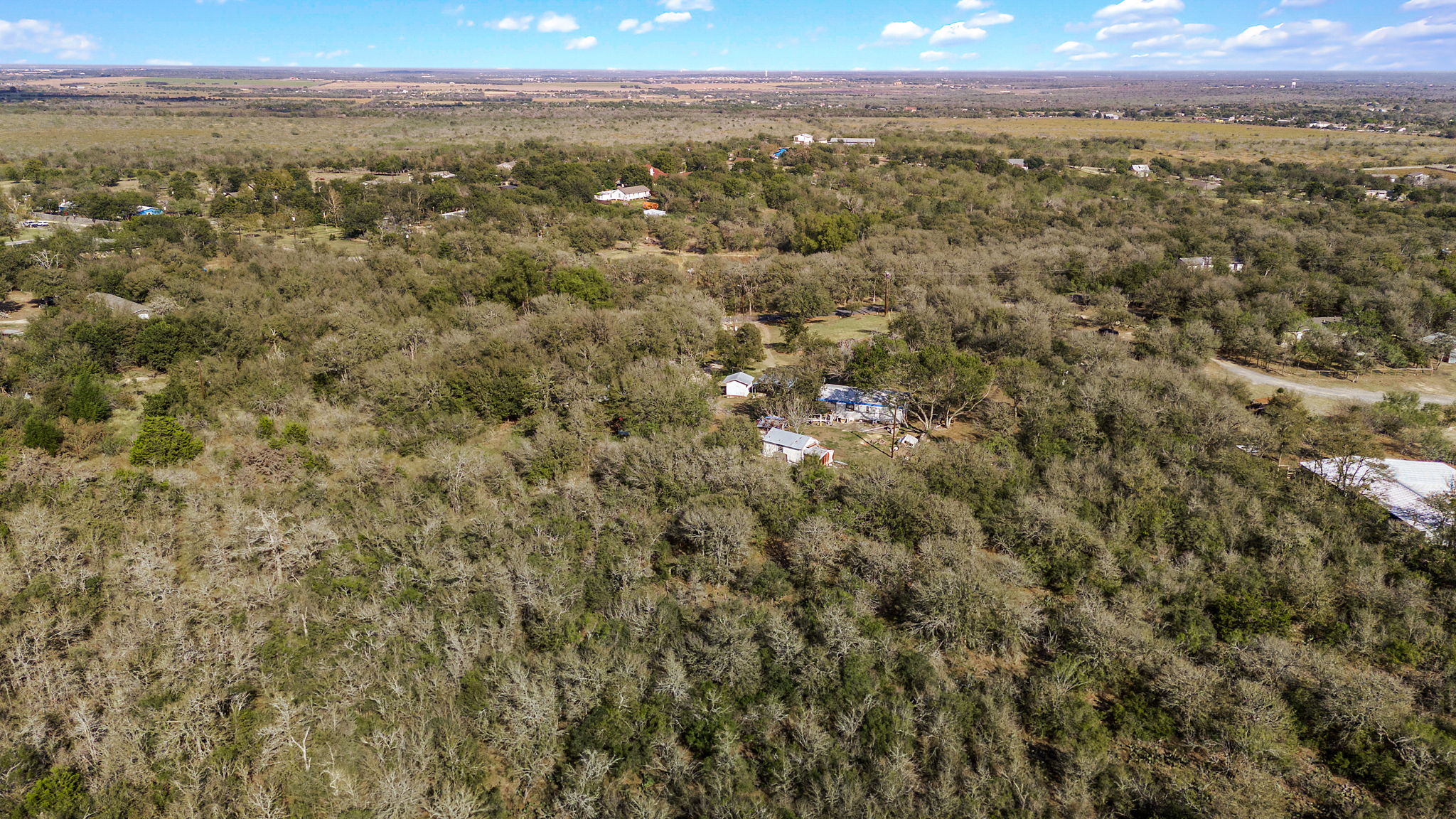1710 Bock Road Buda, TX 78610 - Photo 18 of 21 a view of a city with lush green forest