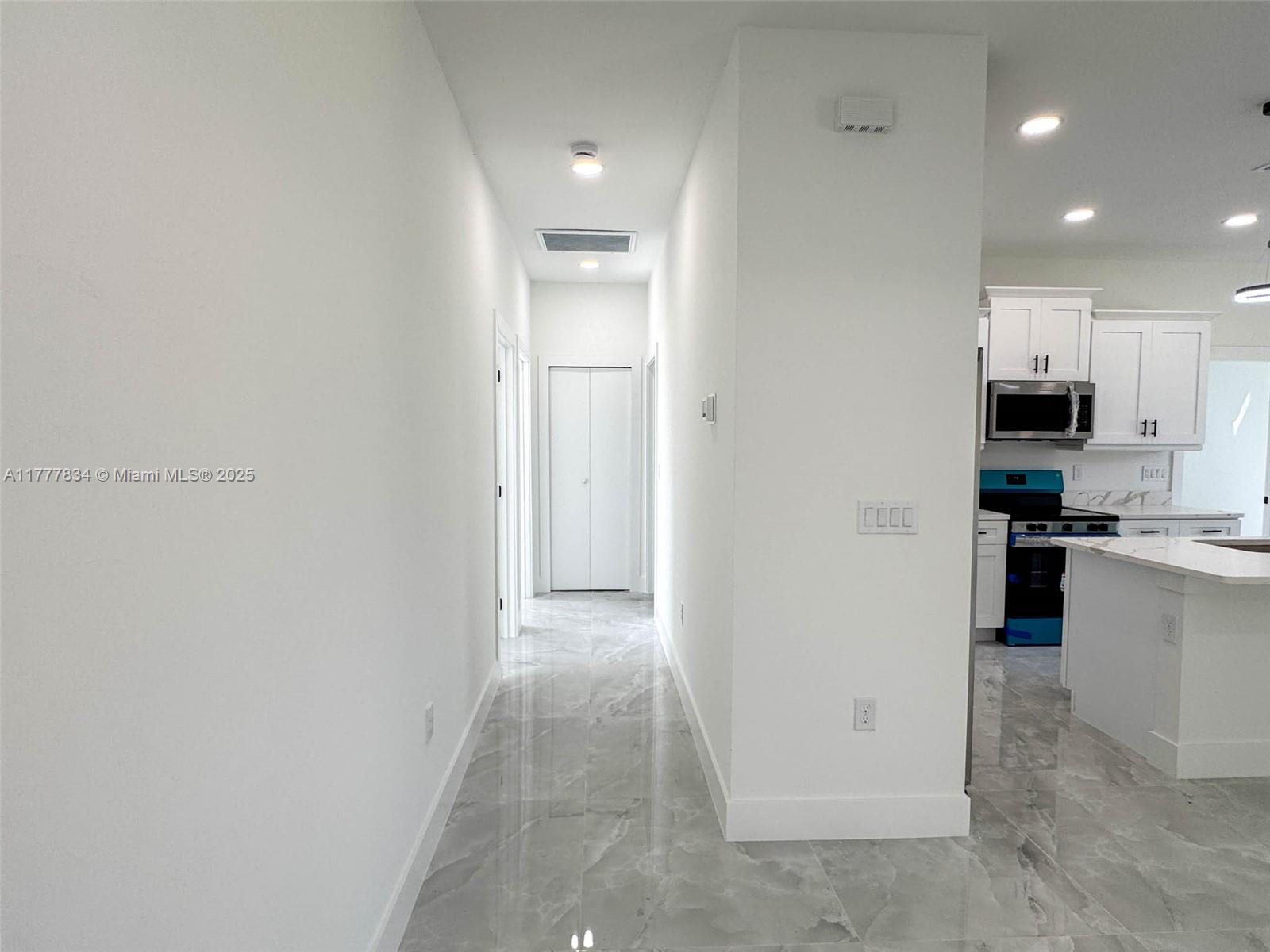 852 Belden Avenue Lehigh Acres, FL 33974 - Photo 14 of 22 Hallway