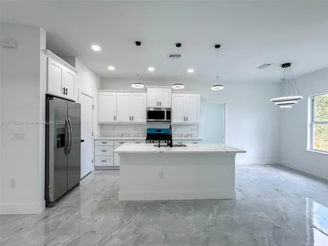 $410,000 | 852 Belden Avenue, Lehigh Acres, FL 33974