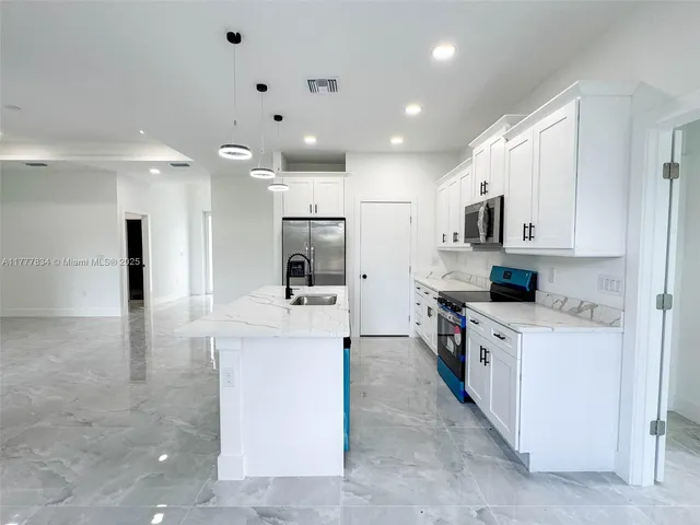 $410,000 | 852 Belden Avenue, Lehigh Acres, FL 33974