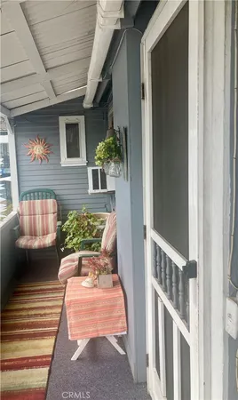 a view of porch with seating space