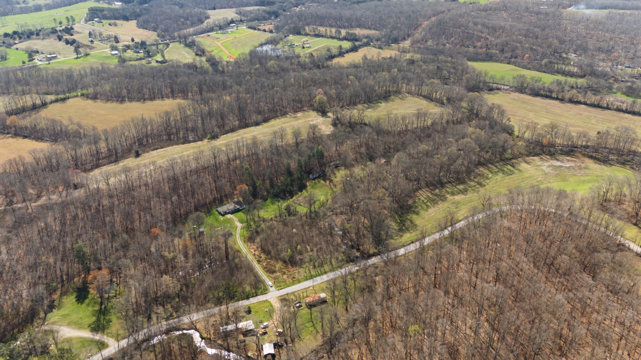 71 Buie Road Summertown, TN 38483 - Photo 4 of 6 a view of a lake with a park