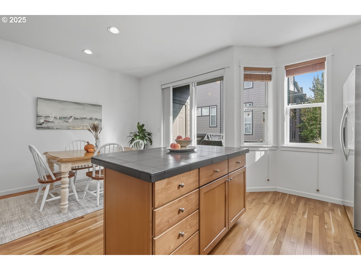 8810 Southeast 12th Avenue Portland, OR 97202 - Photo 15 of 47 a living room with furniture and wooden floor