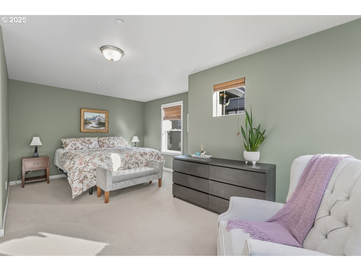 8810 Southeast 12th Avenue Portland, OR 97202 - Photo 29 of 47 a bedroom with a bed and window