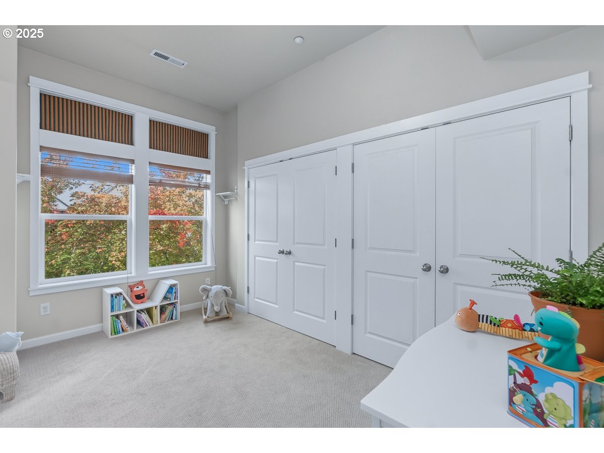 8810 Southeast 12th Avenue Portland, OR 97202 - Photo 34 of 47 a living room with furniture and a window