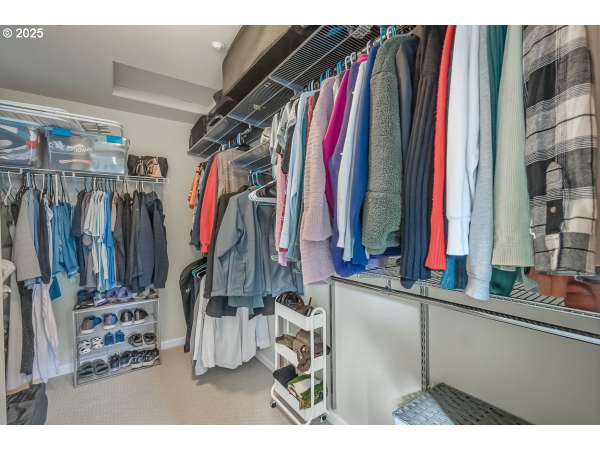 8810 Southeast 12th Avenue Portland, OR 97202 - Photo 37 of 47 a view of walk in closet with clothes
