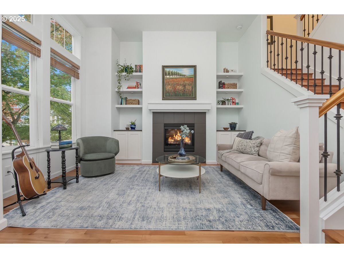 8810 Southeast 12th Avenue Portland, OR 97202 - Photo 4 of 47 a living room with furniture and a fireplace