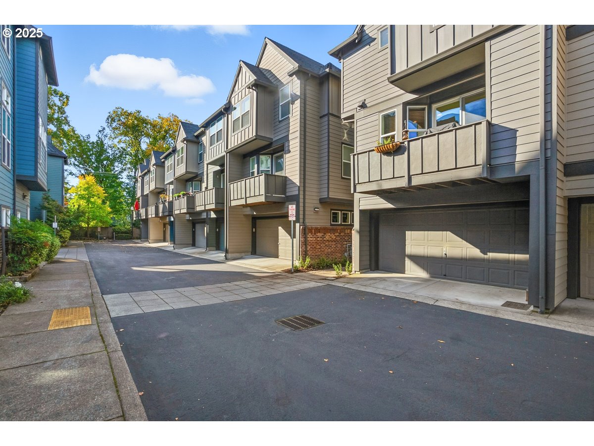 8810 Southeast 12th Avenue Portland, OR 97202 - Photo 41 of 47 a front view of a house with a yard
