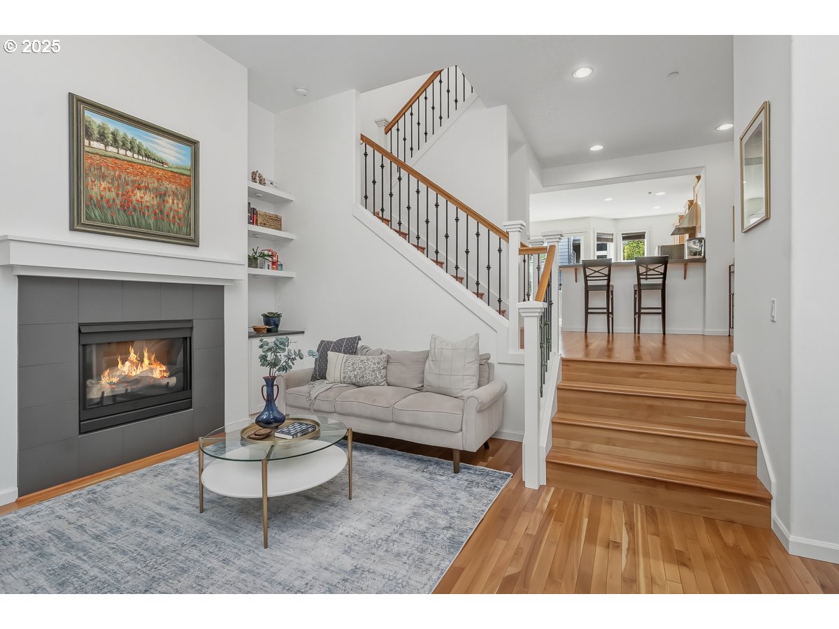 8810 Southeast 12th Avenue Portland, OR 97202 - Photo 9 of 47 a living room with furniture and a fireplace
