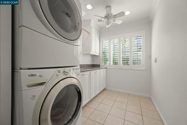 a view of a kitchen with washer and dryer