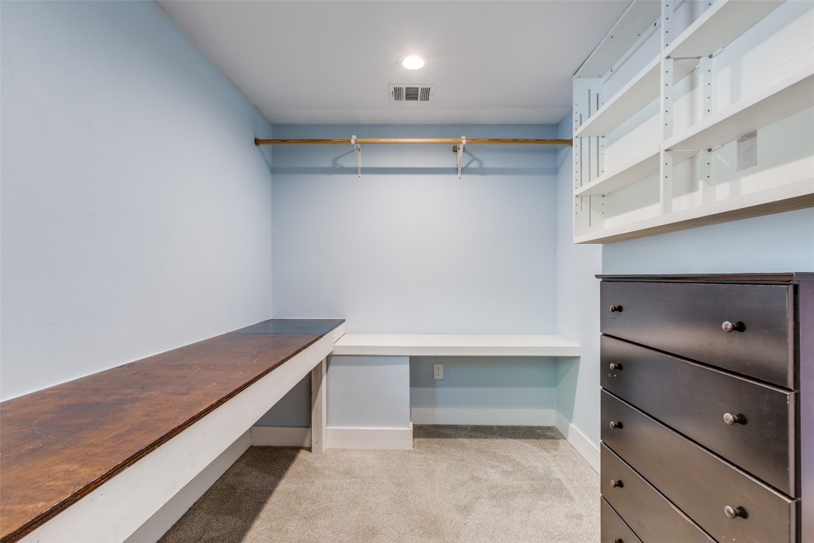 935 La Posada Drive, Unit 155 Austin, TX 78752 - Photo 11 of 25 Walk in closet with light carpet