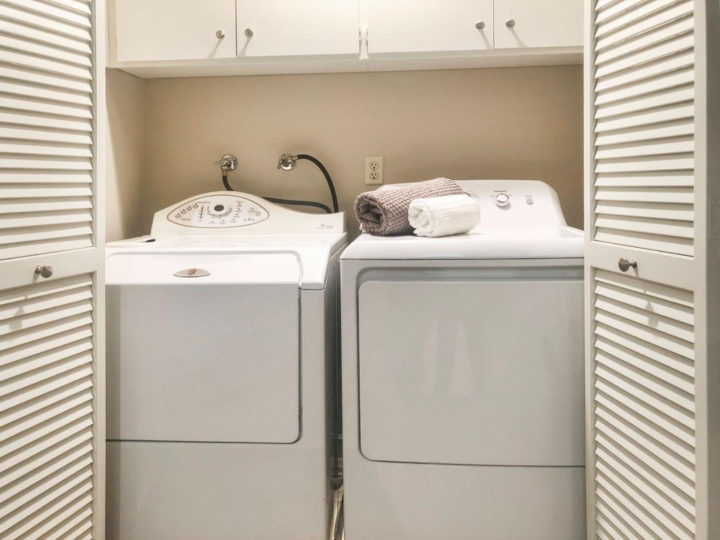 213 Ortega Avenue Mountain View, CA 94040 - Photo 17 of 37 a utility room with dryer and washer