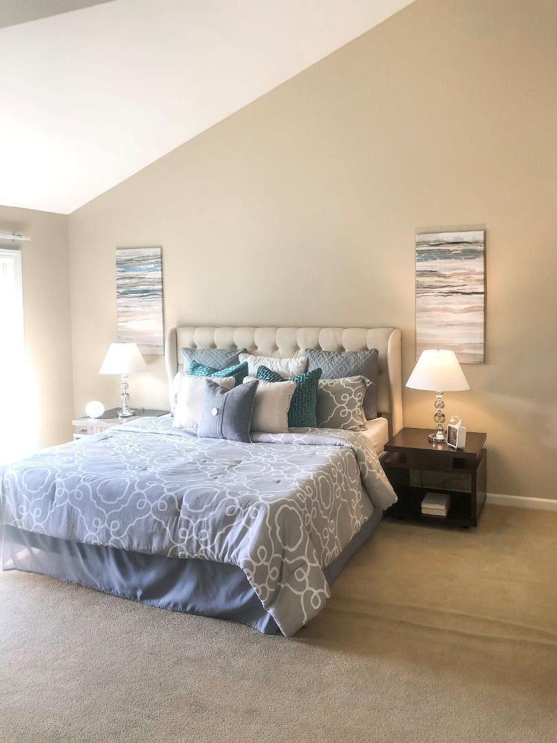 213 Ortega Avenue Mountain View, CA 94040 - Photo 23 of 37 a bedroom with bed and window