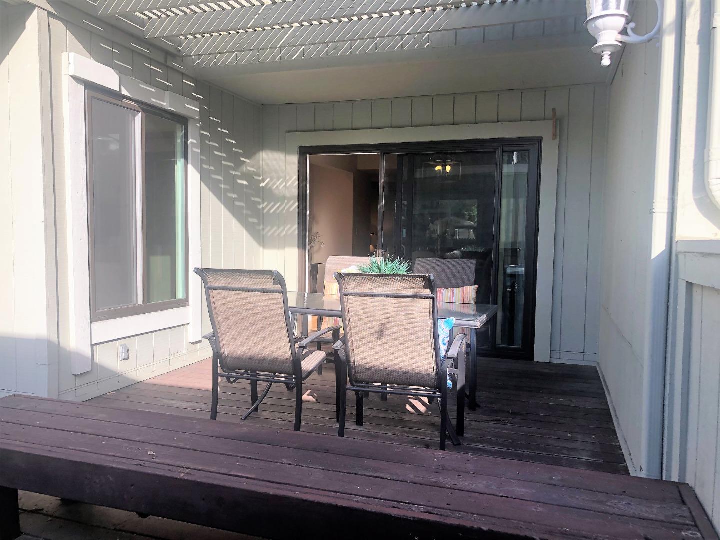 213 Ortega Avenue Mountain View, CA 94040 - Photo 27 of 37 a view of a dining room with furniture and wooden floor