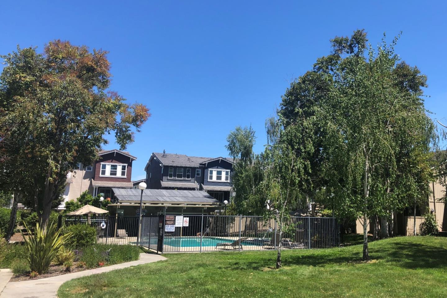 213 Ortega Avenue Mountain View, CA 94040 - Photo 31 of 37 a view of a house with a yard