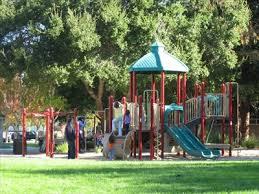 213 Ortega Avenue Mountain View, CA 94040 - Photo 34 of 37 a view of a park with swings and slides