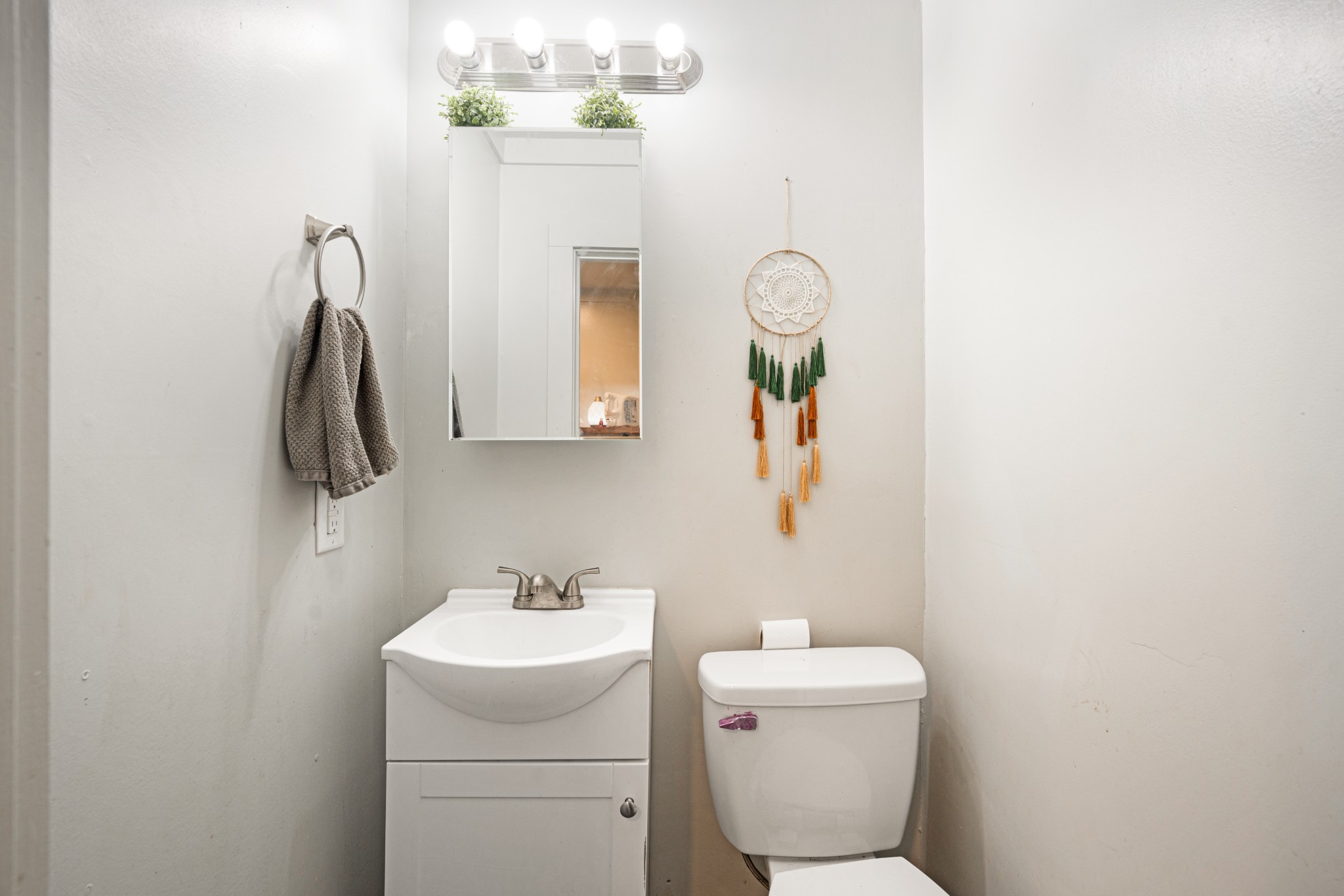 715 Rogues Fork Road Bethpage, TN 37022 - Photo 27 of 68 a bathroom with a toilet sink and mirror