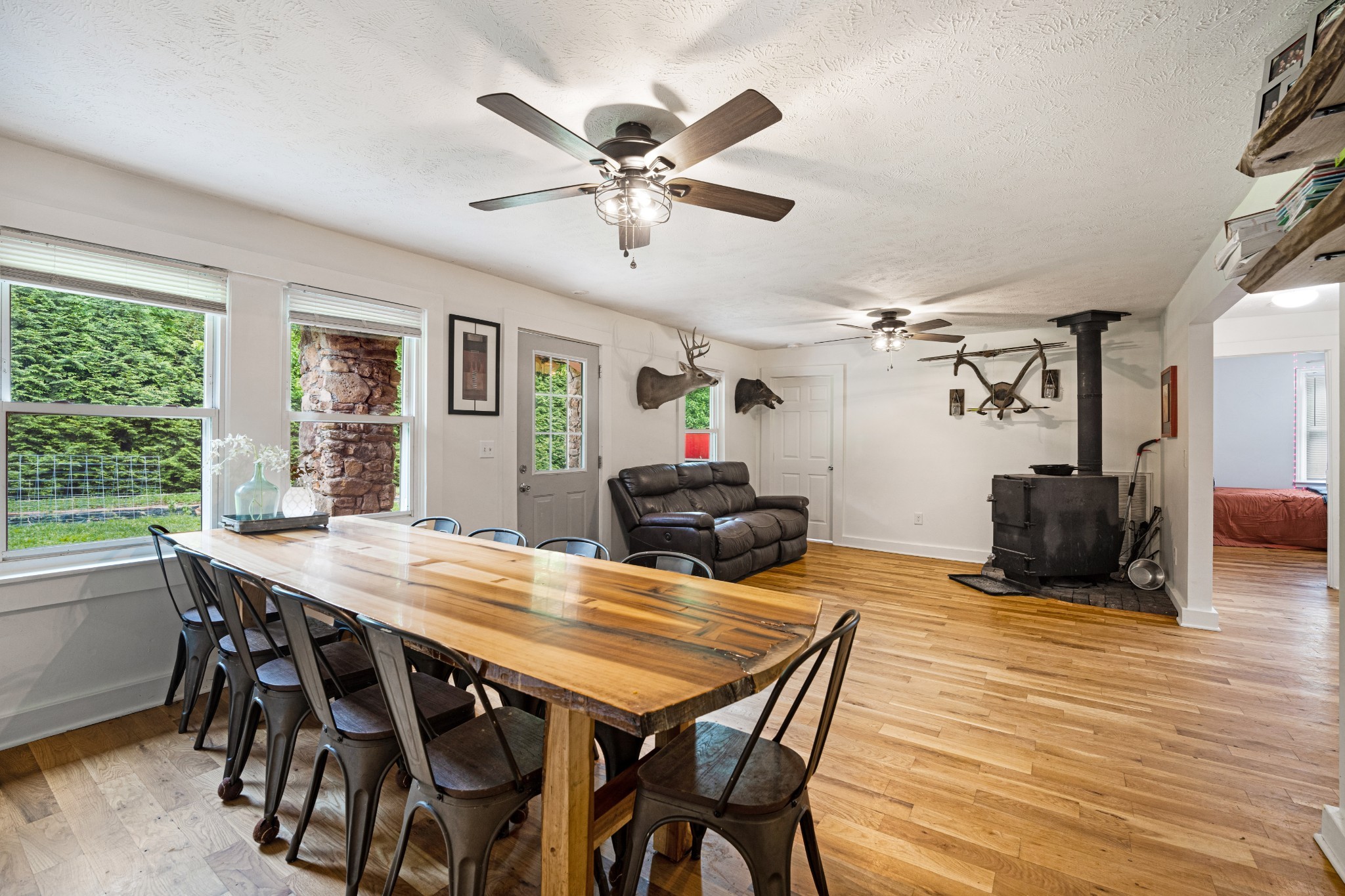 715 Rogues Fork Road Bethpage, TN 37022 - Photo 5 of 68 a view of a dining room with furniture window and wooden floor