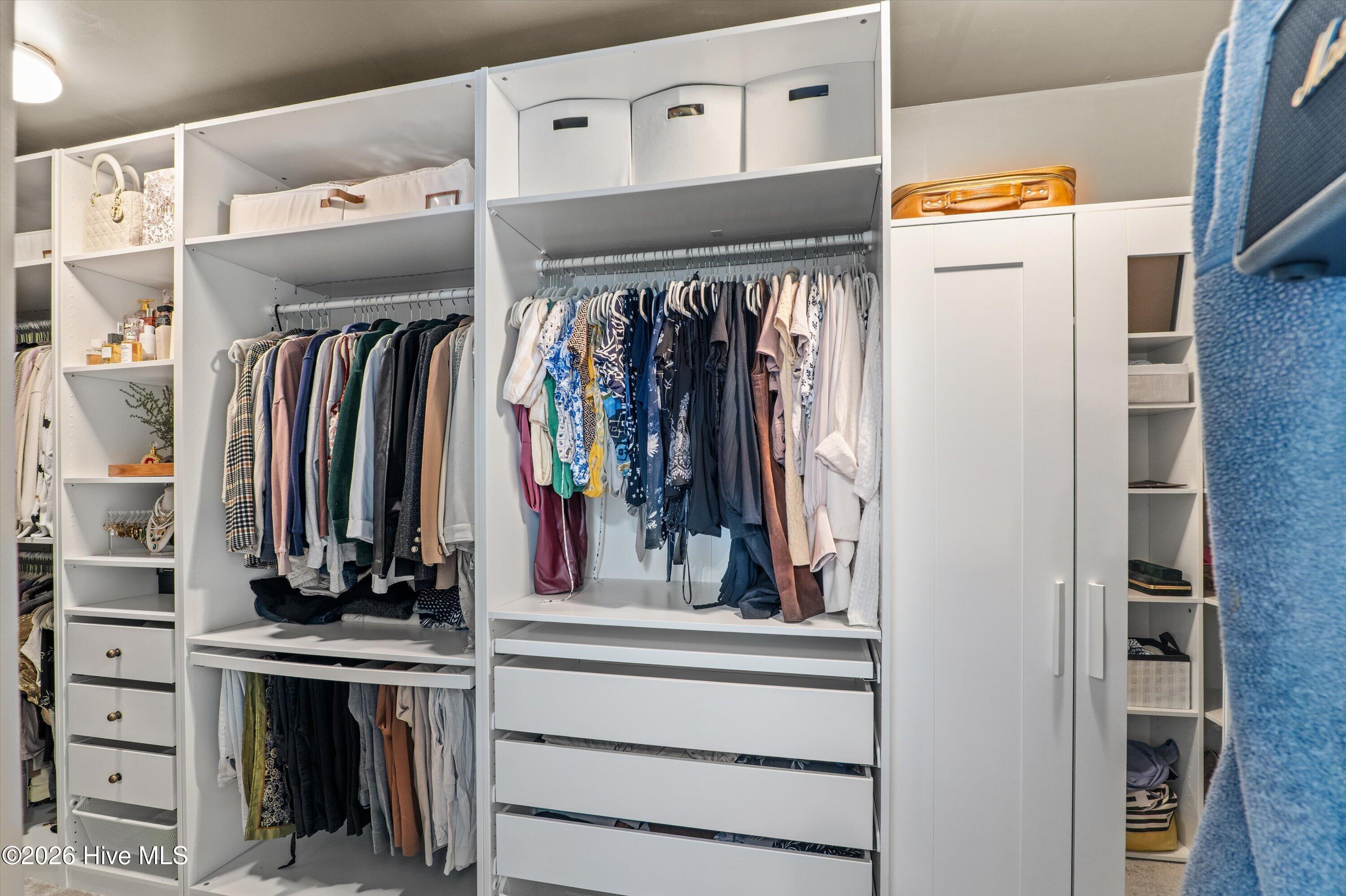 136 Sims Court Augusta, GA 30909 - Photo 25 of 35 Custom shelving in master closet
