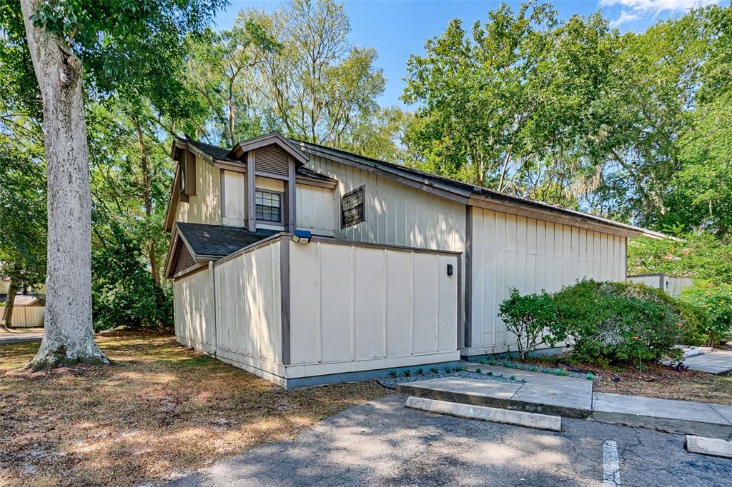 a house with a tree in front of it