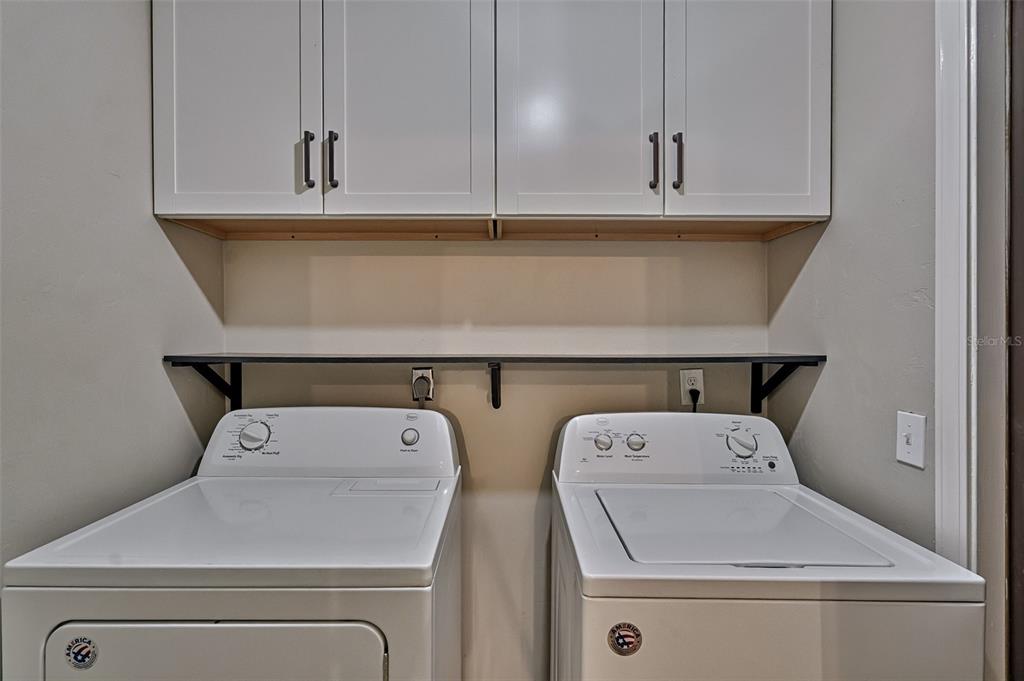 5422 Southwest 4th Place Gainesville, FL 32607 - Photo 14 of 29 a utility room with dryer and washer