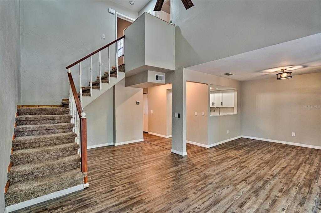 5422 Southwest 4th Place Gainesville, FL 32607 - Photo 6 of 29 a view of entryway and hall with wooden floor