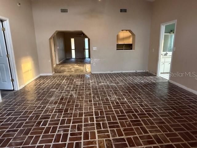 701 Madison Street Tavares, FL 32778 - Photo 3 of 12 a view of a black door and a window
