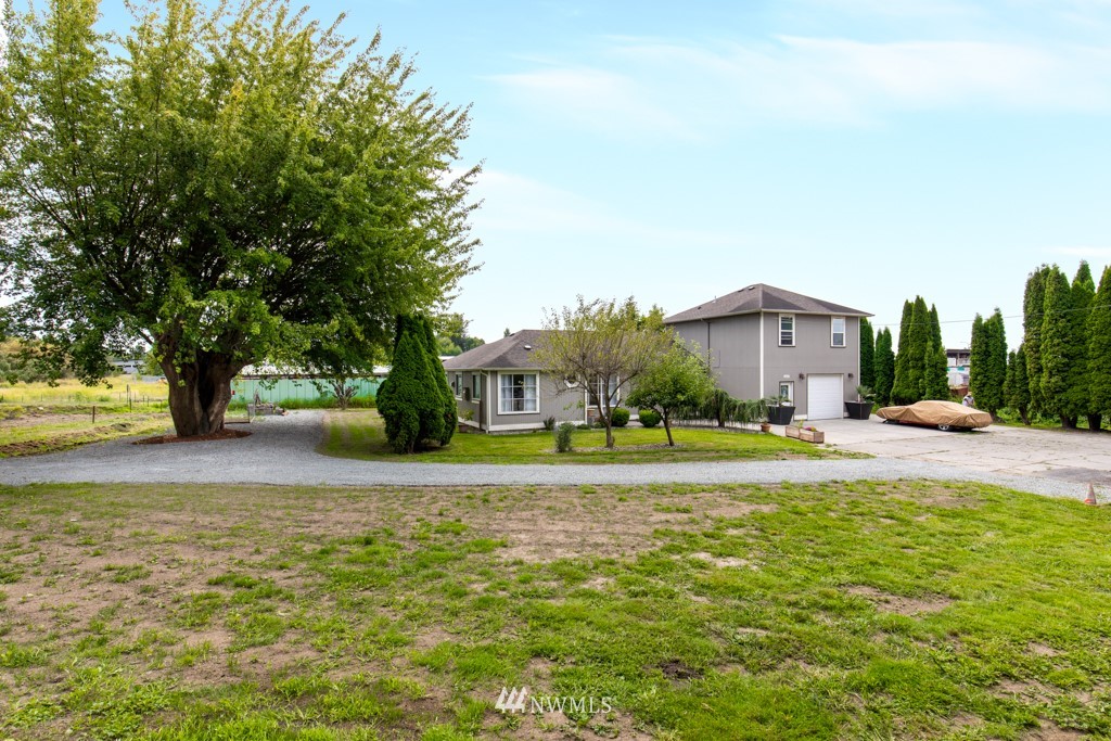 16722 Blodgett Road Mount Vernon, WA 98274 - Photo 1 of 37 a view of a house with a yard