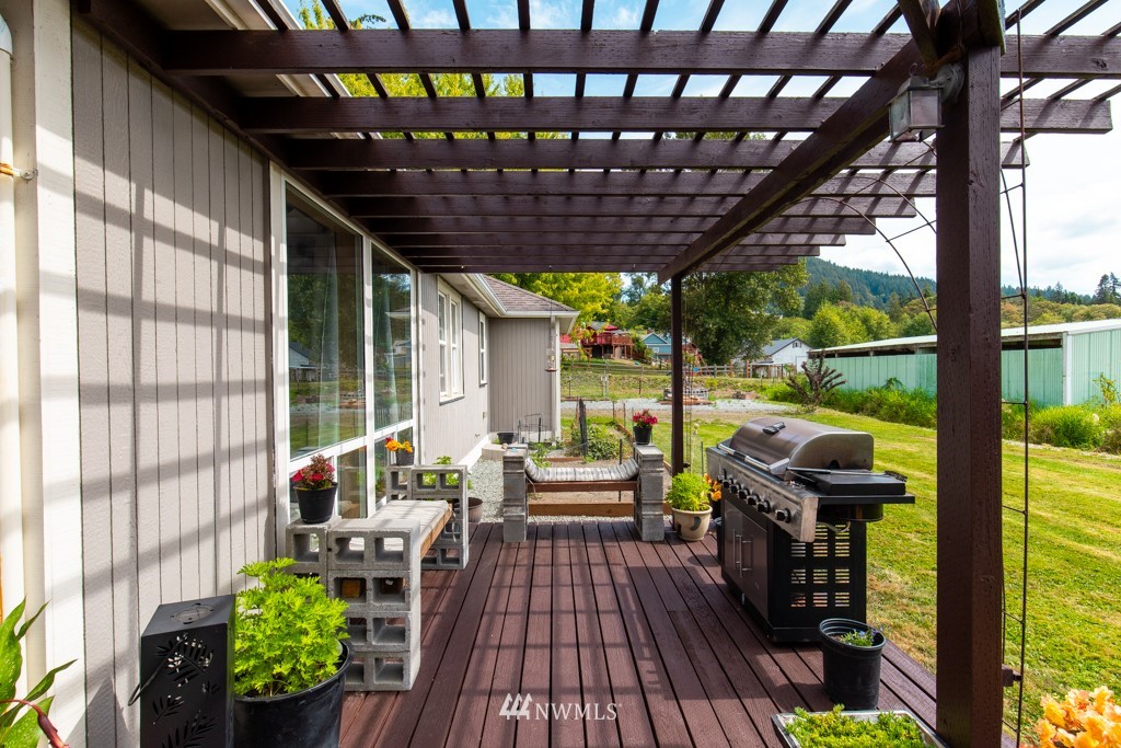 16722 Blodgett Road Mount Vernon, WA 98274 - Photo 12 of 37 a outdoor living space with furniture and garden view