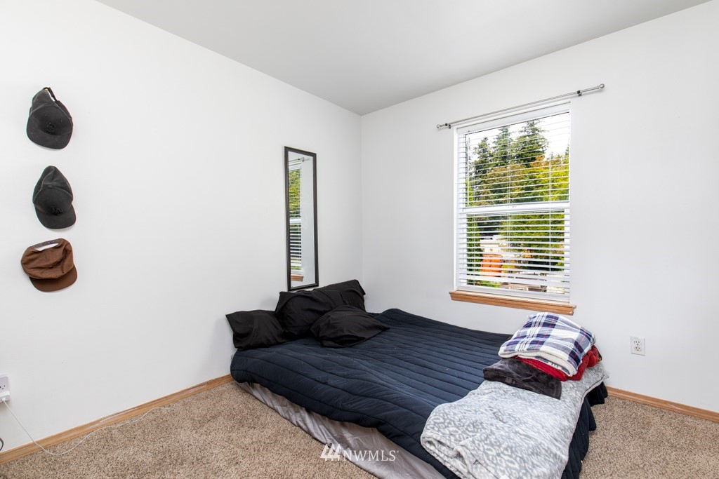 16722 Blodgett Road Mount Vernon, WA 98274 - Photo 30 of 37 a bedroom with furniture and a window