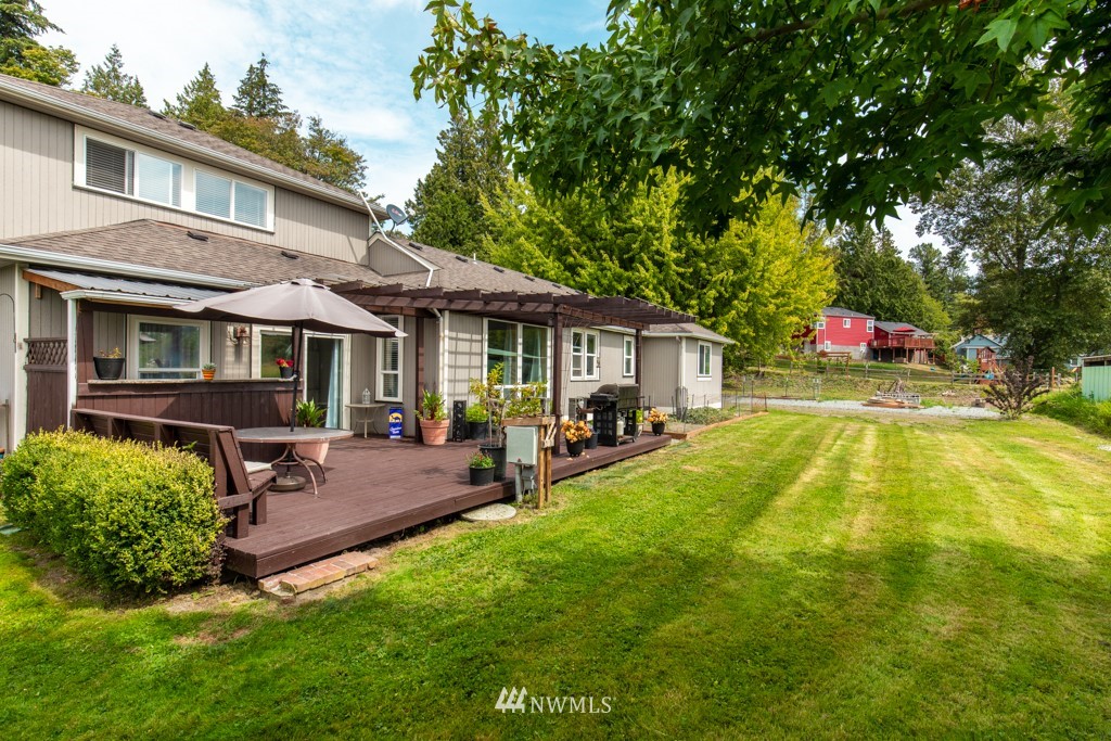 16722 Blodgett Road Mount Vernon, WA 98274 - Photo 9 of 37 a view of a house with swimming pool and sitting area