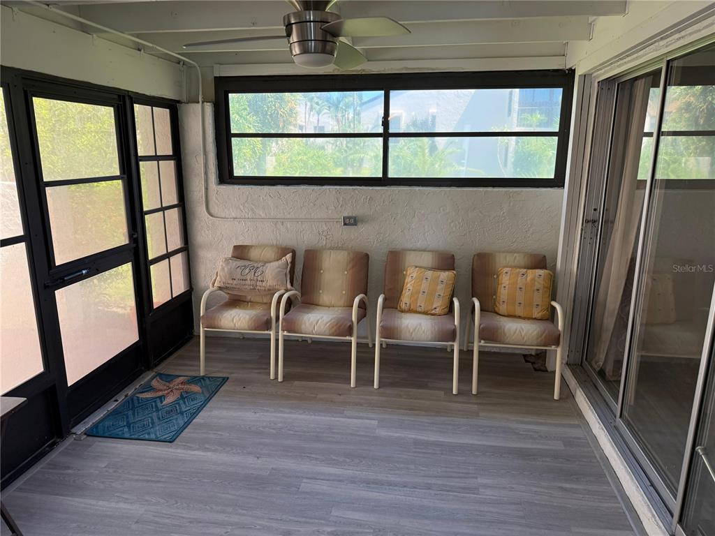 2207 Belleair Road, Unit B22 Clearwater, FL 33764 - Photo 14 of 17 a view of a room with furniture and a window