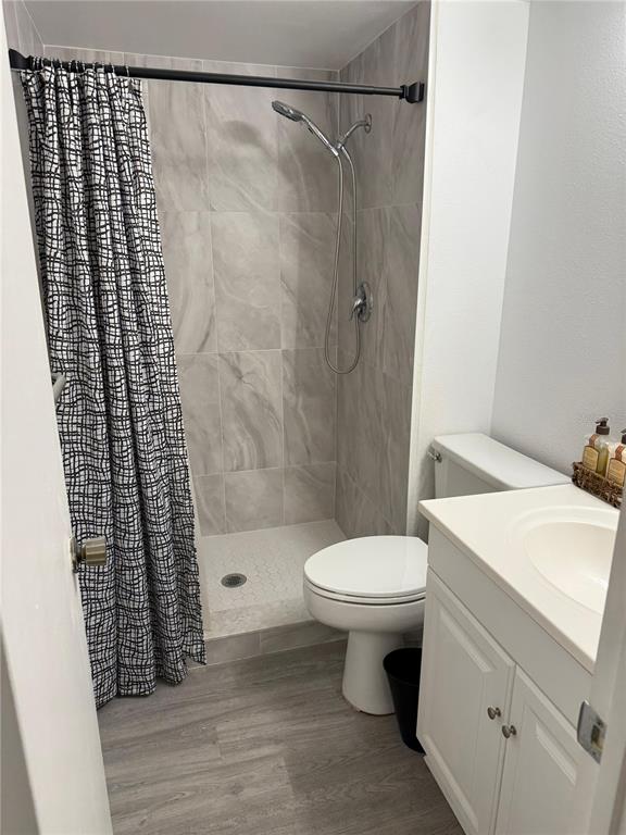 2207 Belleair Road, Unit B22 Clearwater, FL 33764 - Photo 10 of 17 a bathroom with a shower toilet and sink