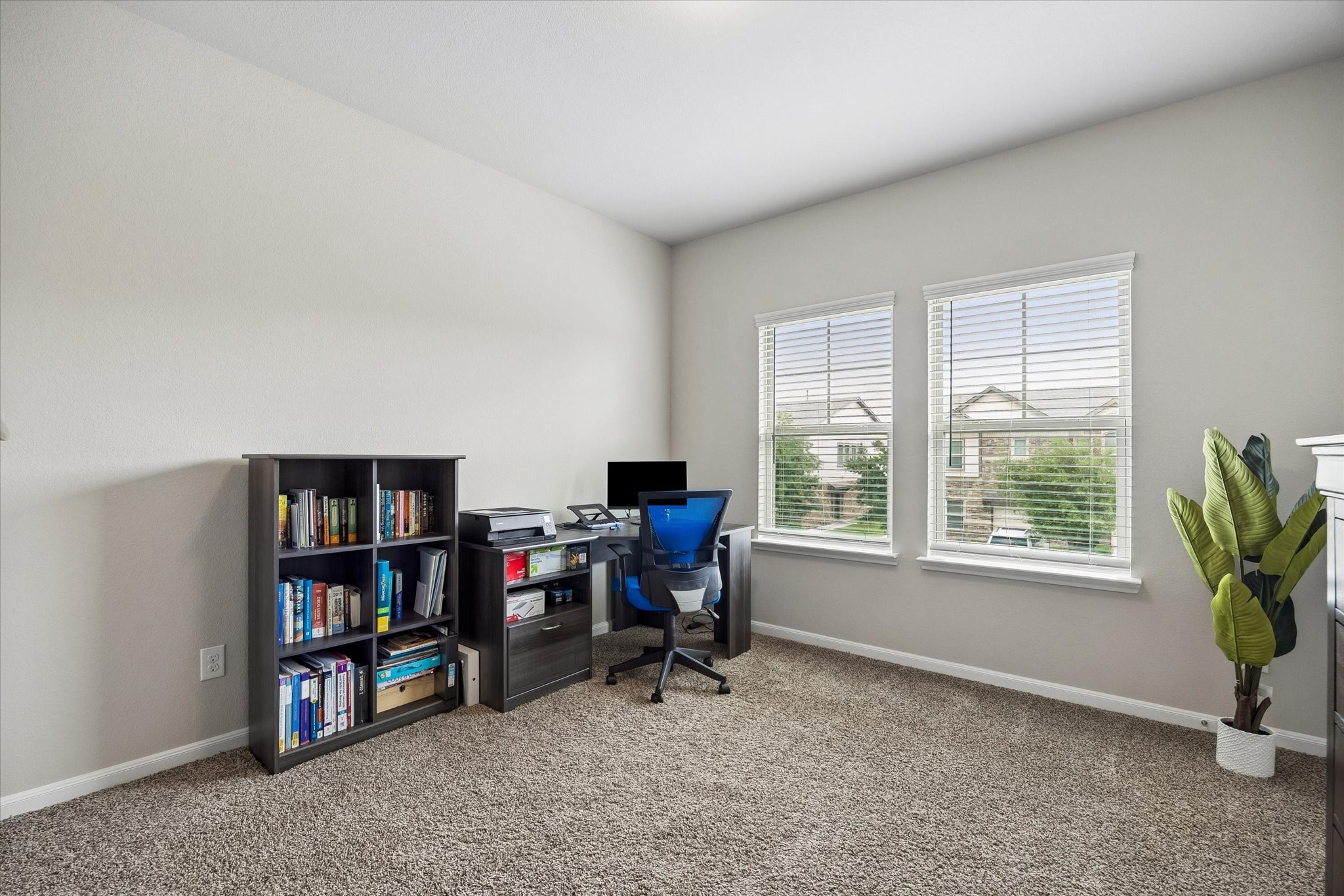 3404 Orch Brg Lane Rosenberg, TX 77471 - Photo 13 of 24 a view of a workspace with furniture and a window