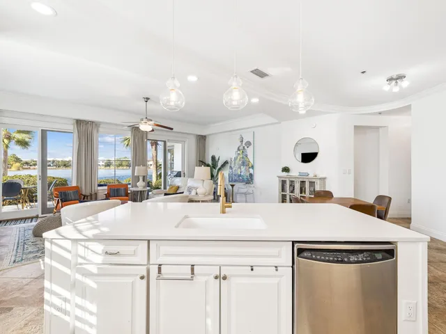 a view of living room with granite countertop furniture and a large window