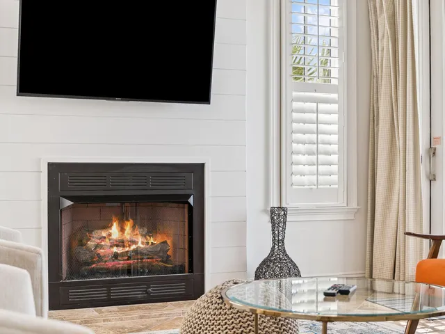 a fireplace with a clock on top of it