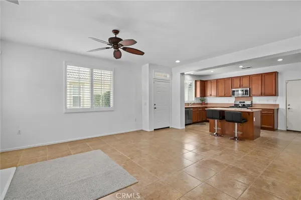 a view of kitchen with furniture and window