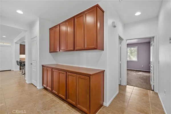 a view of a hallway with closet area