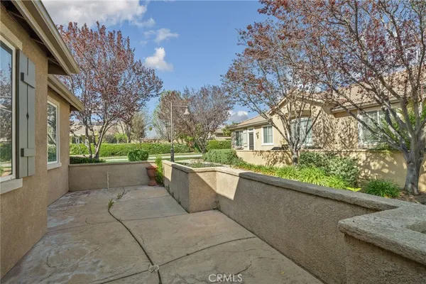 a view of balcony with a potted plant