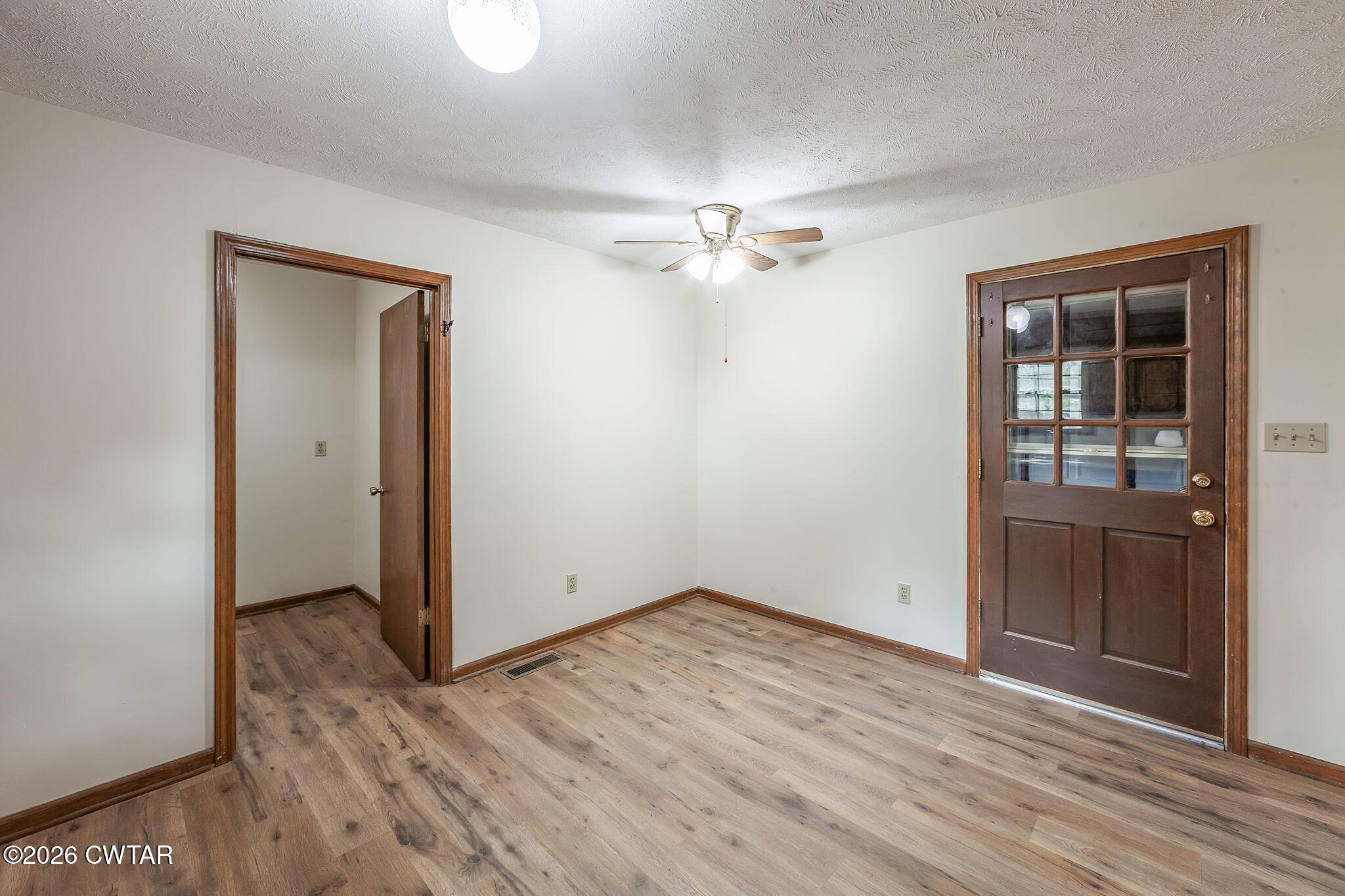 222 Dustin Drive Jackson, TN 38301 - Photo 13 of 30 an empty room with closet and a window