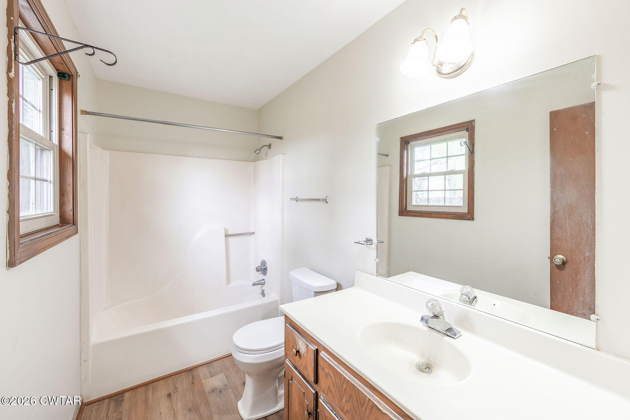 222 Dustin Drive Jackson, TN 38301 - Photo 23 of 30 a bathroom with a sink a toilet and shower