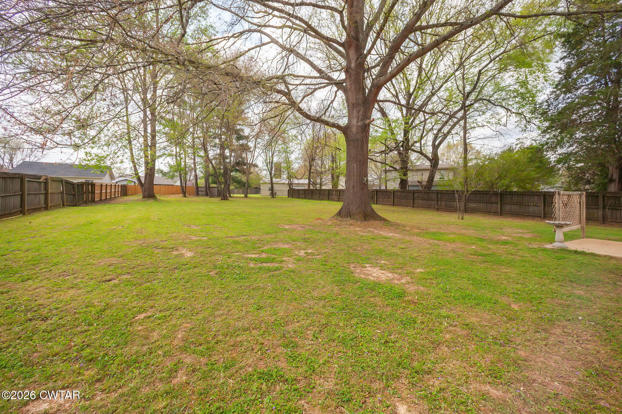222 Dustin Drive Jackson, TN 38301 - Photo 25 of 30 a swimming pool with trees in front of it
