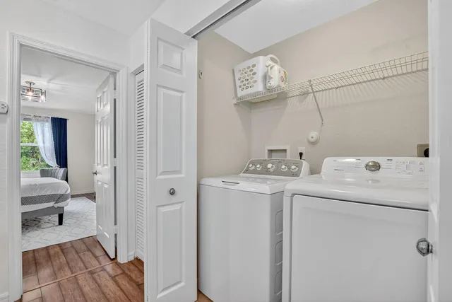 a view of bathroom with a sink and a mirror