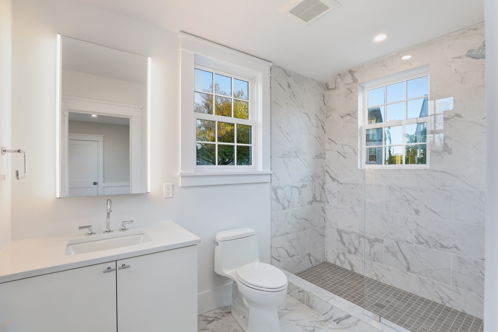 6 Mariner Way Nantucket, MA 02554 - Photo 18 of 31 a bathroom with a sink toilet and shower